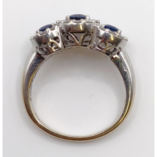 1785 - An 18ct gold, sapphire and diamond three stone ring, ring size J