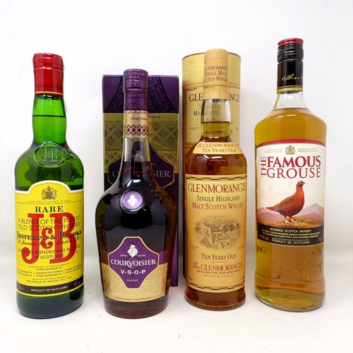 1540 - A litre bottle of Famous Grouse whisky, a bottle of J & B Rare whisky, a bottle of Glenmorangie,... 