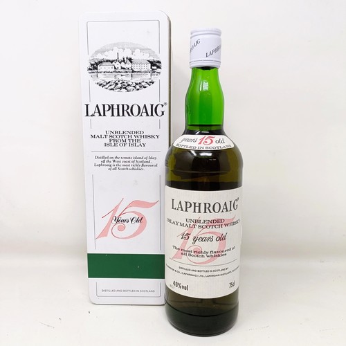 1545 - A bottle of Laphroaig, 15 years old, 40% vol. pre-Royal Warrant, in its tin