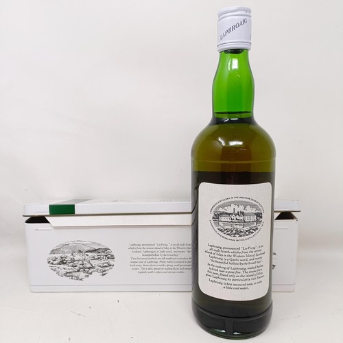 1545 - A bottle of Laphroaig, 15 years old, 40% vol. pre-Royal Warrant, in its tin