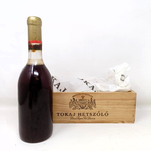 1554 - A half bottle of Tokaj Hetszolo, 1988, in own wooden case...