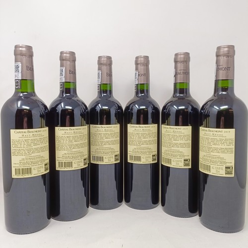 1573 - Twelve bottles of Chateau Beaumont, 2019, in two cardboard boxes