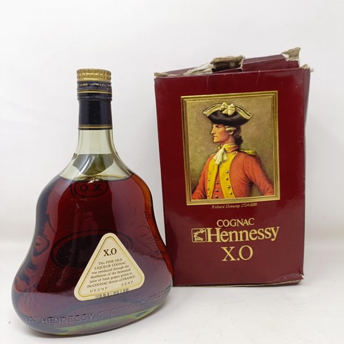 1580 - A bottle of Hennessy XO cognac, with its cardboard box