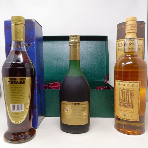 1581 - A litre bottle of Glenmorangie, 10 years old, with its tube, a bottle of Sempe VSOP armagnac, boxed,... 