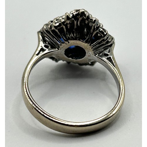 1663 - An 18ct gold, diamond and sapphire cluster ring, ring size M 1/2