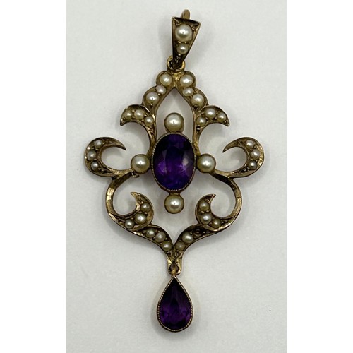 1673 - An Edwardian 9ct gold, seed pearl and amethyst pendant, in a fitted Carrington case