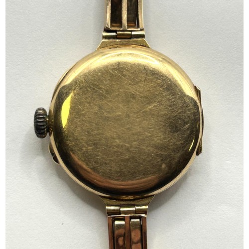 1680 - A ladies 15ct gold wristwatch, on an expandable strap