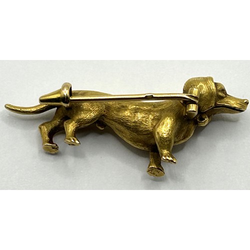 1681 - An early 20th century 18ct gold brooch, in the form of a Dachshund dog, 10.6 g, 4 cm wide