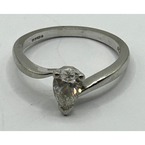 1683 - An 18ct white gold and pear shaped diamond solitaire ring, approx. 60 pts, ring size L 1/2