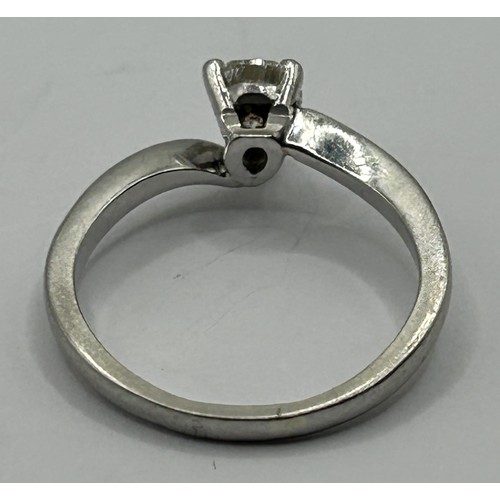 1683 - An 18ct white gold and pear shaped diamond solitaire ring, approx. 60 pts, ring size L 1/2