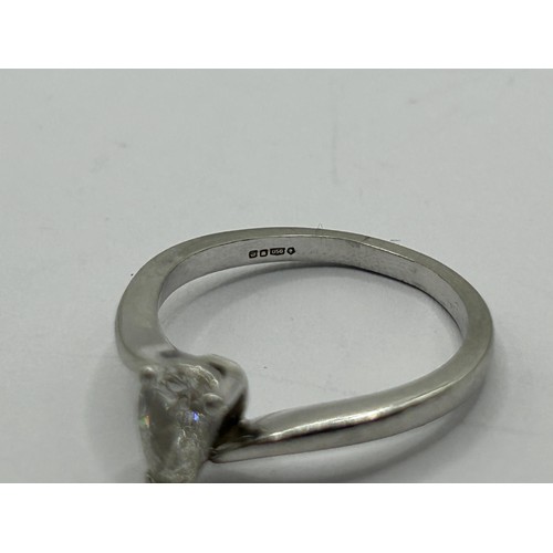 1683 - An 18ct white gold and pear shaped diamond solitaire ring, approx. 60 pts, ring size L 1/2