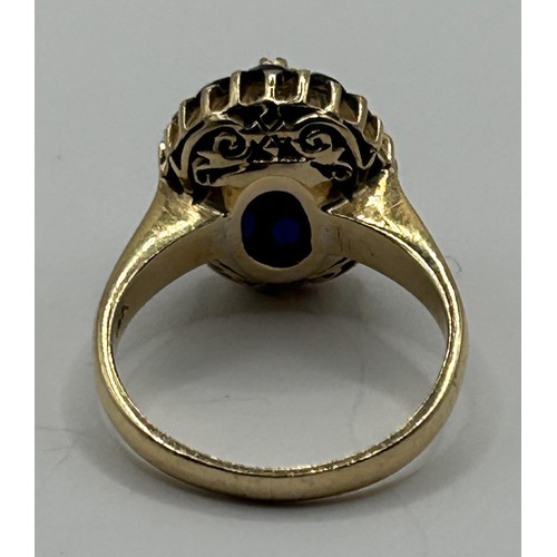 1691 - An 18ct gold, opal and blue stone ring, ring size J