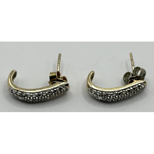 1693 - A pair of 9ct gold and diamond chip earrings