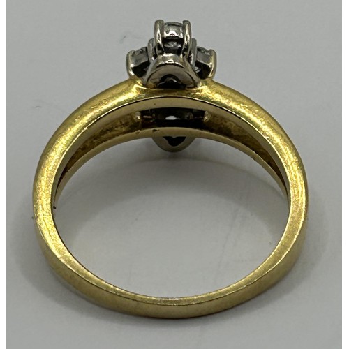 1698 - An 18ct gold and diamond set navette shaped ring, ring size R 1/2