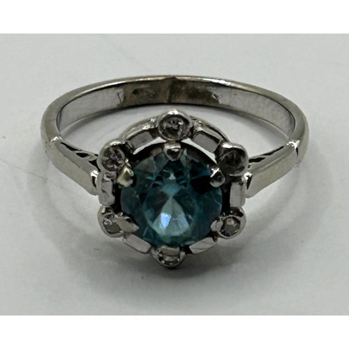 1705 - An 18ct white gold and blue zircon cluster ring, ring size I