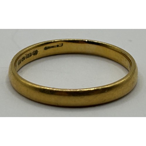 1707 - A 22ct gold wedding band, ring size N