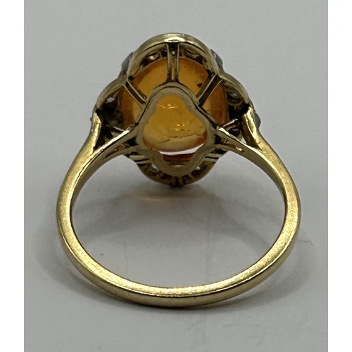 1740 - An 18ct gold, diamond and fire opal ring, ring size M 1/2