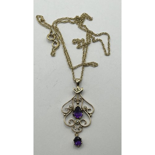 1742 - A 9ct gold and seed pearl pendant, on a chain