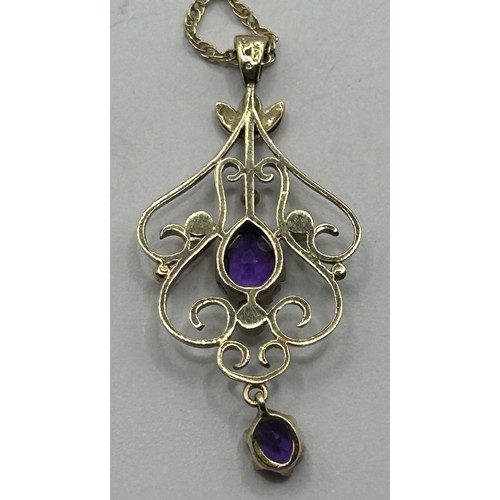 1742 - A 9ct gold and seed pearl pendant, on a chain