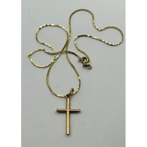 1745 - A 9ct gold cross pendant, on a chain, 3.1 g