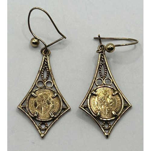 1749 - A pair of yellow metal earrings, inset with a Mexican peso gold coin, 3.7 (all in)