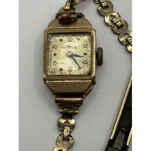 1769 - A 9ct gold ladies wristwatch, on a gold plated strap and three other watches (4)