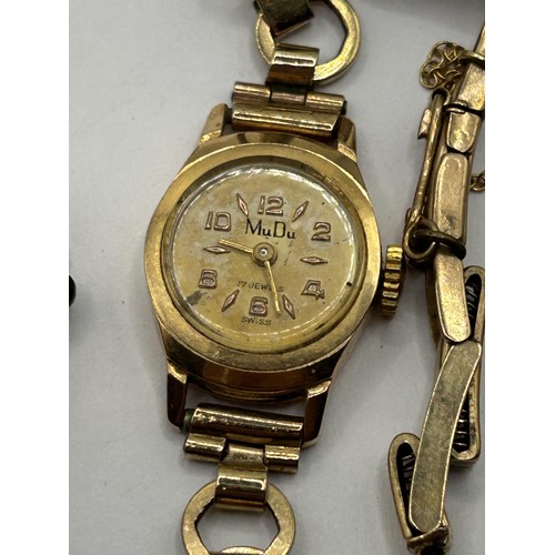 1769 - A 9ct gold ladies wristwatch, on a gold plated strap and three other watches (4)