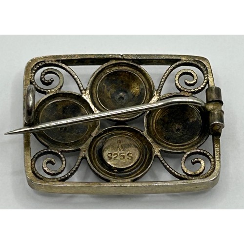 1784 - A silver and white enamel brooch