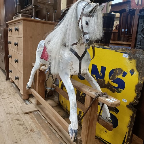 1808 - A wooden dapple grey rocking horse, affectionately known as Mabel, 120 cm wide