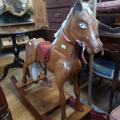 1811 - A pine rocking horse, on bow rockers, 96 cm high