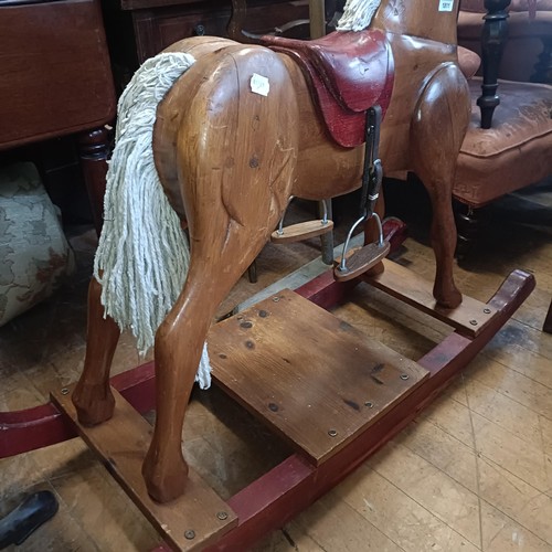 1811 - A pine rocking horse, on bow rockers, 96 cm high