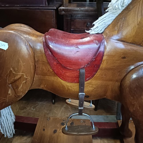 1811 - A pine rocking horse, on bow rockers, 96 cm high