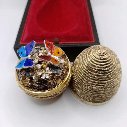 1738 - A silver gilt and enamel surprise egg, Stuart Devlin, no. 74, London 1975, boxed