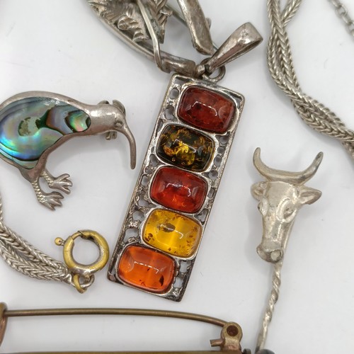 1694 - A silver and amber pendant, and assorted other costume jewellery