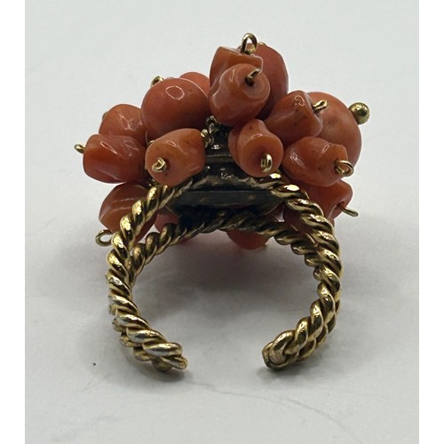 1609 - A coral set ring, ring size approx. J 1/2