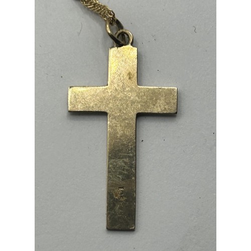 1611 - A yellow metal cross pendant, on a 9ct gold chain