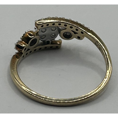 1632 - A 9ct gold and diamond dress ring, ring size R