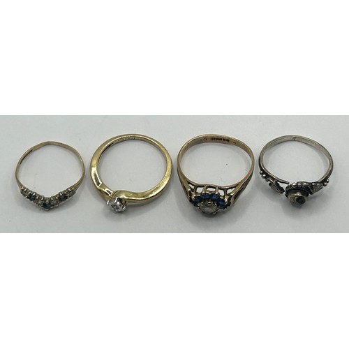 1633 - A 9ct gold gem set ring, and three other rings (4)