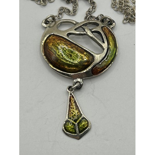 1655 - An Art Nouveau style silver and enamel pendant, on a chain