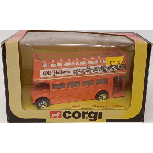 1008 - A Corgi model of a bus, No 469, and assorted other model cards, buses and trucks, all boxed (box)