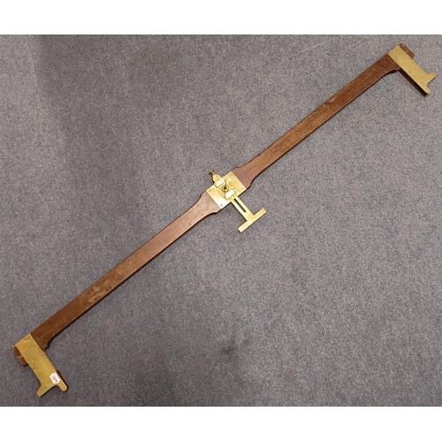 1205 - Railway interest: a GWR Sig Dept mahogany and brass mounted track gauge, 17.3.39, 156 cm