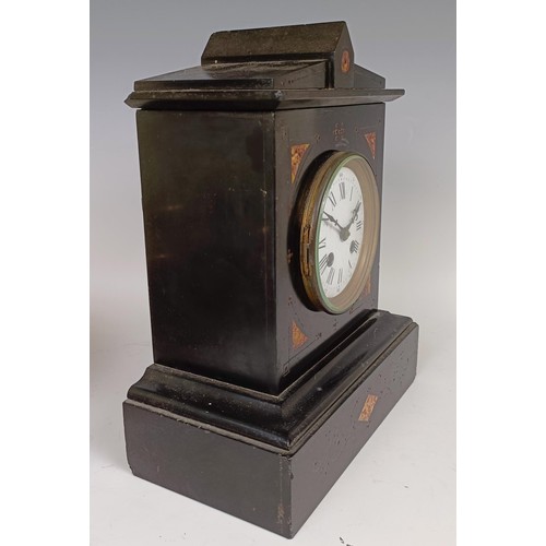 1209 - A Victorian black slate mantel clock, 30 cm high, a Japanese clock and a clock movement (3)