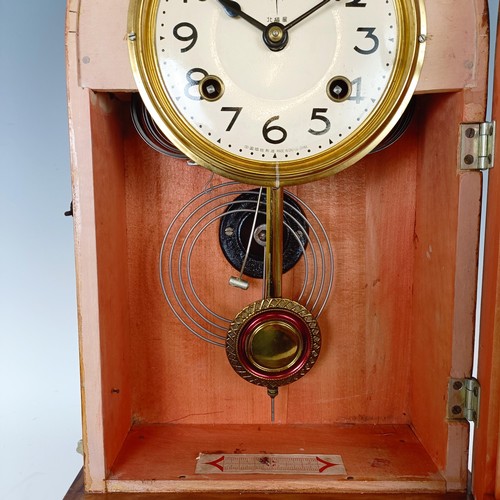 1209 - A Victorian black slate mantel clock, 30 cm high, a Japanese clock and a clock movement (3)