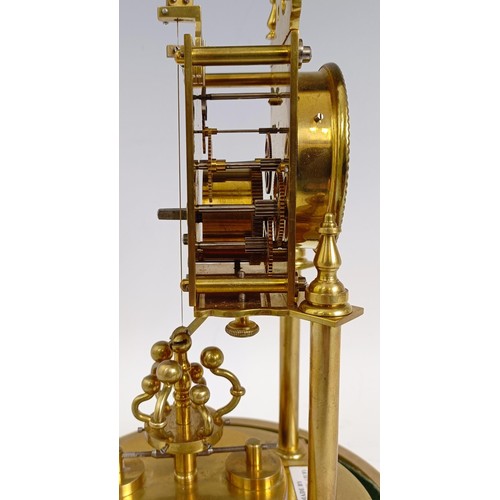 1213 - A brass 400 day anniversary clock, under a glass dome, 30 cm high