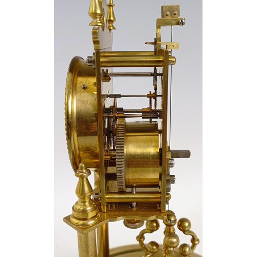 1213 - A brass 400 day anniversary clock, under a glass dome, 30 cm high