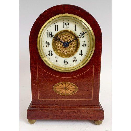 1214 - An Edwardian mantel clock, in an inlaid mahogany case, 21.5 cm high, and two others similar (3)