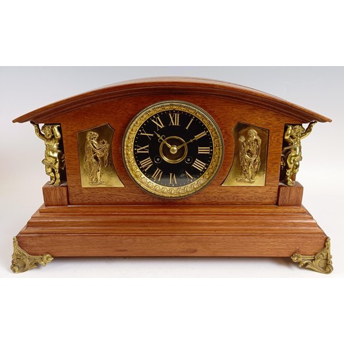 1219 - An Edwardian mantel clock, in a gilt metal and walnut case, 25 cm high, and two other clocks (3) Pro... 