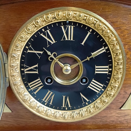 1219 - An Edwardian mantel clock, in a gilt metal and walnut case, 25 cm high, and two other clocks (3) Pro... 