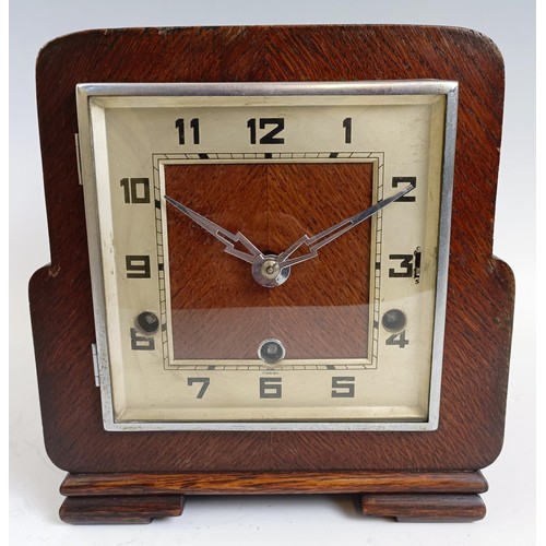 1219 - An Edwardian mantel clock, in a gilt metal and walnut case, 25 cm high, and two other clocks (3) Pro... 