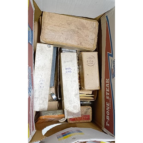 1229 - Assorted clock and watch makers parts and tools (4 boxes)